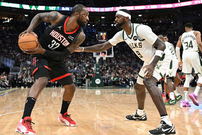 Dec 17, 2023; Milwaukee, Wisconsin, USA; Houston Rockets forward Jeff Green (32) drives against Milwaukee Bucks forward Bobby Portis (9) in the second half at Fiserv Forum.